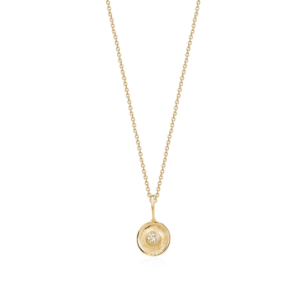 Mini Evil Eye pendant in 18k gold and raw rosecut diamond.